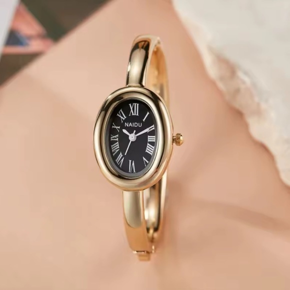 Anthropologie Accessories - Baignoire Gold Oval Watch with Black Dial